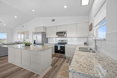 Island-Style Coastal Retreat in Holiday Beach, Rockport, TX on Lamar Golf Course in Texas - for sale on GolfHomes.com, golf home, golf lot