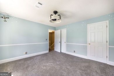 This beautifully updated home is located in a private gated on Canongate At Healy Point Country Club in Georgia - for sale on GolfHomes.com, golf home, golf lot