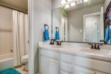 Welcome to this beautifully maintained 4-bedroom, 3.5-bath home on Woodbridge Golf Club in Texas - for sale on GolfHomes.com, golf home, golf lot
