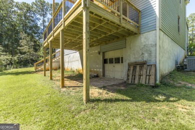 This beautifully updated home is located in a private gated on Canongate At Healy Point Country Club in Georgia - for sale on GolfHomes.com, golf home, golf lot