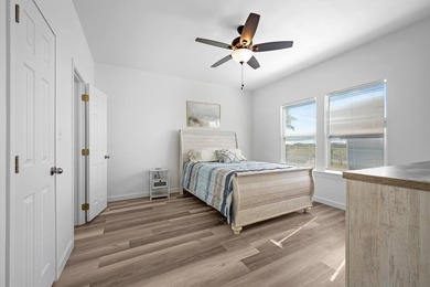 Island-Style Coastal Retreat in Holiday Beach, Rockport, TX on Lamar Golf Course in Texas - for sale on GolfHomes.com, golf home, golf lot