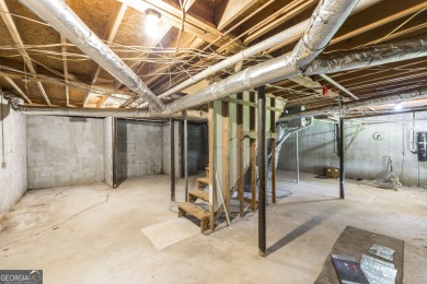 This beautifully updated home is located in a private gated on Canongate At Healy Point Country Club in Georgia - for sale on GolfHomes.com, golf home, golf lot