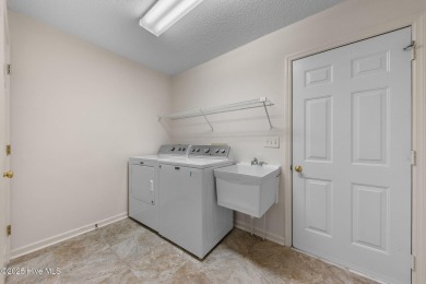 Live where comfort meets convenience, just minutes from on Country Club of North Carolina in North Carolina - for sale on GolfHomes.com, golf home, golf lot