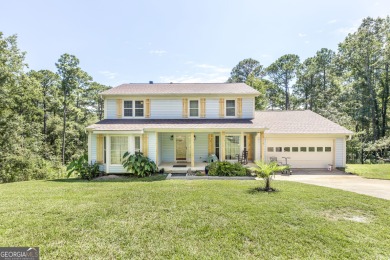 This beautifully updated home is located in a private gated on Canongate At Healy Point Country Club in Georgia - for sale on GolfHomes.com, golf home, golf lot