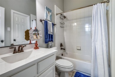 Welcome to this beautifully maintained 4-bedroom, 3.5-bath home on Woodbridge Golf Club in Texas - for sale on GolfHomes.com, golf home, golf lot