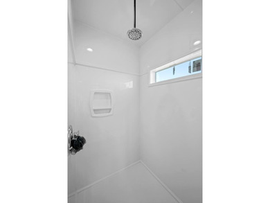 Island-Style Coastal Retreat in Holiday Beach, Rockport, TX on Lamar Golf Course in Texas - for sale on GolfHomes.com, golf home, golf lot