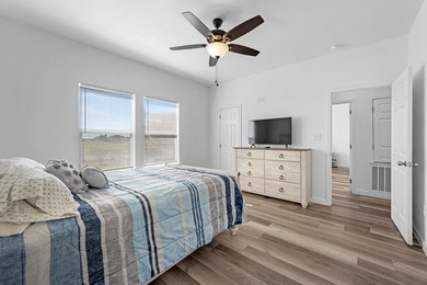 Island-Style Coastal Retreat in Holiday Beach, Rockport, TX on Lamar Golf Course in Texas - for sale on GolfHomes.com, golf home, golf lot