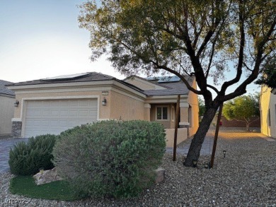 Sun City Aliante home, enjoy sitting on your covered patio with on Aliante Golf Club in Nevada - for sale on GolfHomes.com, golf home, golf lot
