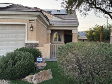 Sun City Aliante home, enjoy sitting on your covered patio with on Aliante Golf Club in Nevada - for sale on GolfHomes.com, golf home, golf lot