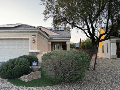 Sun City Aliante home, enjoy sitting on your covered patio with on Aliante Golf Club in Nevada - for sale on GolfHomes.com, golf home, golf lot