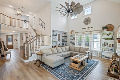 Beautiful 4-bedroom 3.5 bathrooms Waterfront home sitting on 1 on Rocky Branch Golf Club in Georgia - for sale on GolfHomes.com, golf home, golf lot