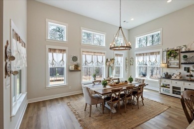 Beautiful 4-bedroom 3.5 bathrooms Waterfront home sitting on 1 on Rocky Branch Golf Club in Georgia - for sale on GolfHomes.com, golf home, golf lot