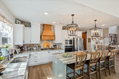 Beautiful 4-bedroom 3.5 bathrooms Waterfront home sitting on 1 on Rocky Branch Golf Club in Georgia - for sale on GolfHomes.com, golf home, golf lot