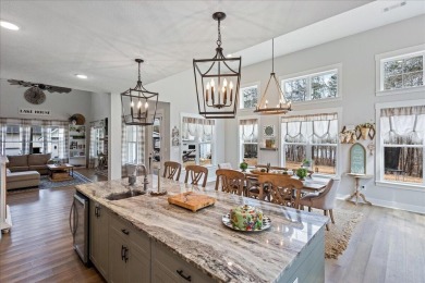 Beautiful 4-bedroom 3.5 bathrooms Waterfront home sitting on 1 on Rocky Branch Golf Club in Georgia - for sale on GolfHomes.com, golf home, golf lot