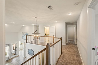 Beautiful 4-bedroom 3.5 bathrooms Waterfront home sitting on 1 on Rocky Branch Golf Club in Georgia - for sale on GolfHomes.com, golf home, golf lot