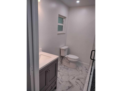 Welcome to this completely remodeled 3-bed, 2-bath home in a 55+ on Leisureville Community Golf Course in Florida - for sale on GolfHomes.com, golf home, golf lot