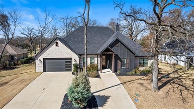 Located in the gated community of Pinnacle Club, this home was on Pinnacle Golf and Boat Club in Texas - for sale on GolfHomes.com, golf home, golf lot