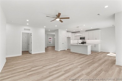 Stunning new construction located in the sought-after, guarded on Carolina Trace Country Club in North Carolina - for sale on GolfHomes.com, golf home, golf lot