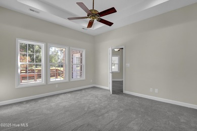 Welcome to this custom-built brick home with an open floor plan on Olde Point Golf and Country Club in North Carolina - for sale on GolfHomes.com, golf home, golf lot