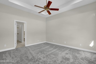 Welcome to this custom-built brick home with an open floor plan on Olde Point Golf and Country Club in North Carolina - for sale on GolfHomes.com, golf home, golf lot