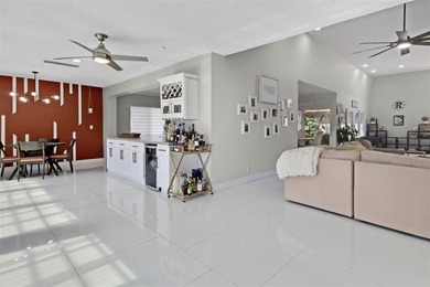 Beautiful 3-bed, 2-bath single-family home with over 2,500 sq ft on Woodlands Country Club in Florida - for sale on GolfHomes.com, golf home, golf lot