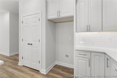 Stunning new construction located in the sought-after, guarded on Carolina Trace Country Club in North Carolina - for sale on GolfHomes.com, golf home, golf lot