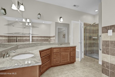 Welcome to this custom-built brick home with an open floor plan on Olde Point Golf and Country Club in North Carolina - for sale on GolfHomes.com, golf home, golf lot