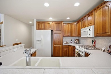 MLS# 290781  Introducing E101 -- a premier end-unit condo on Canyon Lakes Golf Course in Washington - for sale on GolfHomes.com, golf home, golf lot