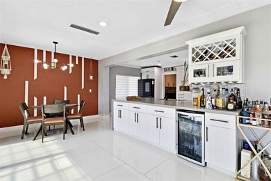 Beautiful 3-bed, 2-bath single-family home with over 2,500 sq ft on Woodlands Country Club in Florida - for sale on GolfHomes.com, golf home, golf lot