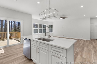 Stunning new construction located in the sought-after, guarded on Carolina Trace Country Club in North Carolina - for sale on GolfHomes.com, golf home, golf lot