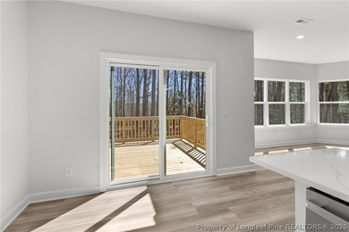 Stunning new construction located in the sought-after, guarded on Carolina Trace Country Club in North Carolina - for sale on GolfHomes.com, golf home, golf lot