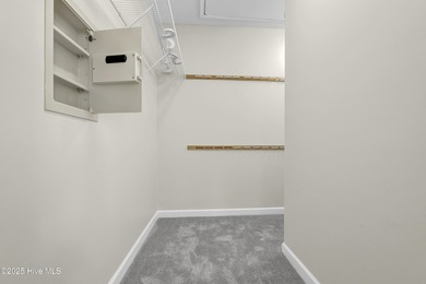 Welcome to this custom-built brick home with an open floor plan on Olde Point Golf and Country Club in North Carolina - for sale on GolfHomes.com, golf home, golf lot