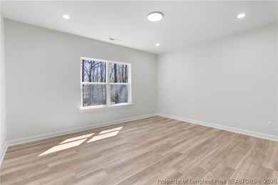 Stunning new construction located in the sought-after, guarded on Carolina Trace Country Club in North Carolina - for sale on GolfHomes.com, golf home, golf lot