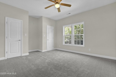 Welcome to this custom-built brick home with an open floor plan on Olde Point Golf and Country Club in North Carolina - for sale on GolfHomes.com, golf home, golf lot