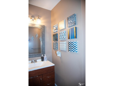 Charming Grosse Ile home situated walking distance to the water on West Shore Golf and Country Club in Michigan - for sale on GolfHomes.com, golf home, golf lot