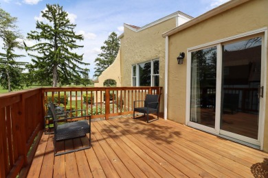 Surrounded by lakes and located on a golf course, this home is on Nippersink Golf Resort in Wisconsin - for sale on GolfHomes.com, golf home, golf lot