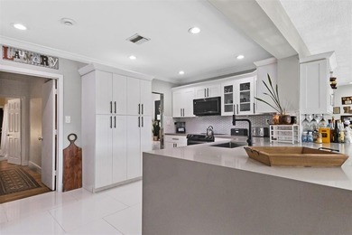 Beautiful 3-bed, 2-bath single-family home with over 2,500 sq ft on Woodlands Country Club in Florida - for sale on GolfHomes.com, golf home, golf lot