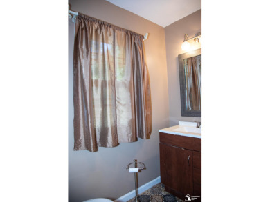 Charming Grosse Ile home situated walking distance to the water on West Shore Golf and Country Club in Michigan - for sale on GolfHomes.com, golf home, golf lot