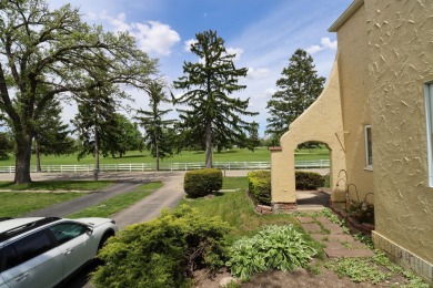 Surrounded by lakes and located on a golf course, this home is on Nippersink Golf Resort in Wisconsin - for sale on GolfHomes.com, golf home, golf lot