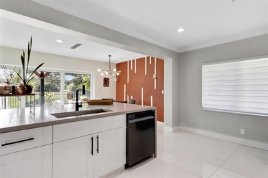 Beautiful 3-bed, 2-bath single-family home with over 2,500 sq ft on Woodlands Country Club in Florida - for sale on GolfHomes.com, golf home, golf lot