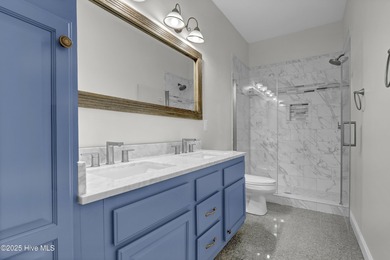 Welcome to this custom-built brick home with an open floor plan on Olde Point Golf and Country Club in North Carolina - for sale on GolfHomes.com, golf home, golf lot