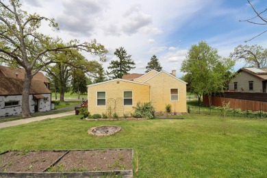 Surrounded by lakes and located on a golf course, this home is on Nippersink Golf Resort in Wisconsin - for sale on GolfHomes.com, golf home, golf lot