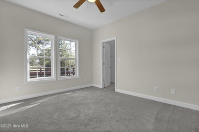 Welcome to this custom-built brick home with an open floor plan on Olde Point Golf and Country Club in North Carolina - for sale on GolfHomes.com, golf home, golf lot