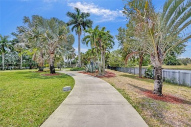 Step into a world of luxury with this rare, expansive corner on Inverrary Country Club in Florida - for sale on GolfHomes.com, golf home, golf lot