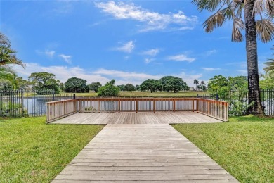 Step into a world of luxury with this rare, expansive corner on Inverrary Country Club in Florida - for sale on GolfHomes.com, golf home, golf lot