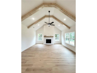 Stunning new construction home on a completely flat .37 acre on Bella Vista Country Club - Highlands in Arkansas - for sale on GolfHomes.com, golf home, golf lot