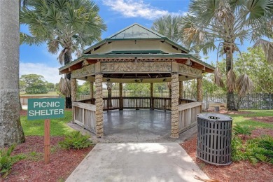 Step into a world of luxury with this rare, expansive corner on Inverrary Country Club in Florida - for sale on GolfHomes.com, golf home, golf lot