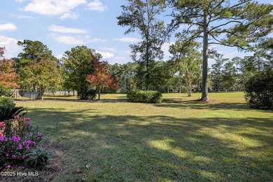 Welcome to this custom-built brick home with an open floor plan on Olde Point Golf and Country Club in North Carolina - for sale on GolfHomes.com, golf home, golf lot