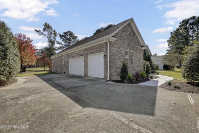 Welcome to this custom-built brick home with an open floor plan on Olde Point Golf and Country Club in North Carolina - for sale on GolfHomes.com, golf home, golf lot