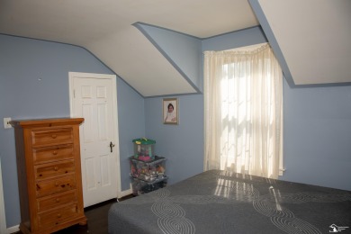 Charming Grosse Ile home situated walking distance to the water on West Shore Golf and Country Club in Michigan - for sale on GolfHomes.com, golf home, golf lot